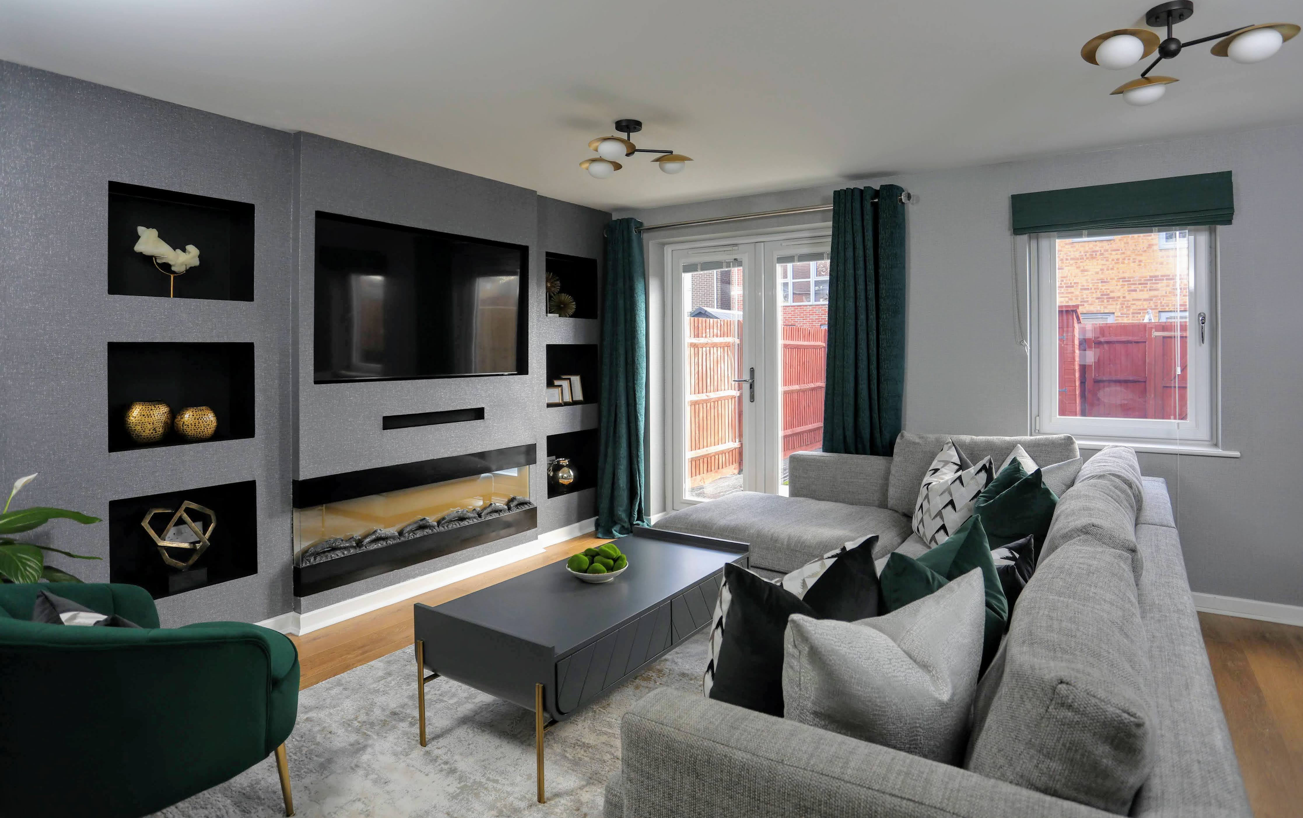 A completed contemporary living room by NateBel Interiors